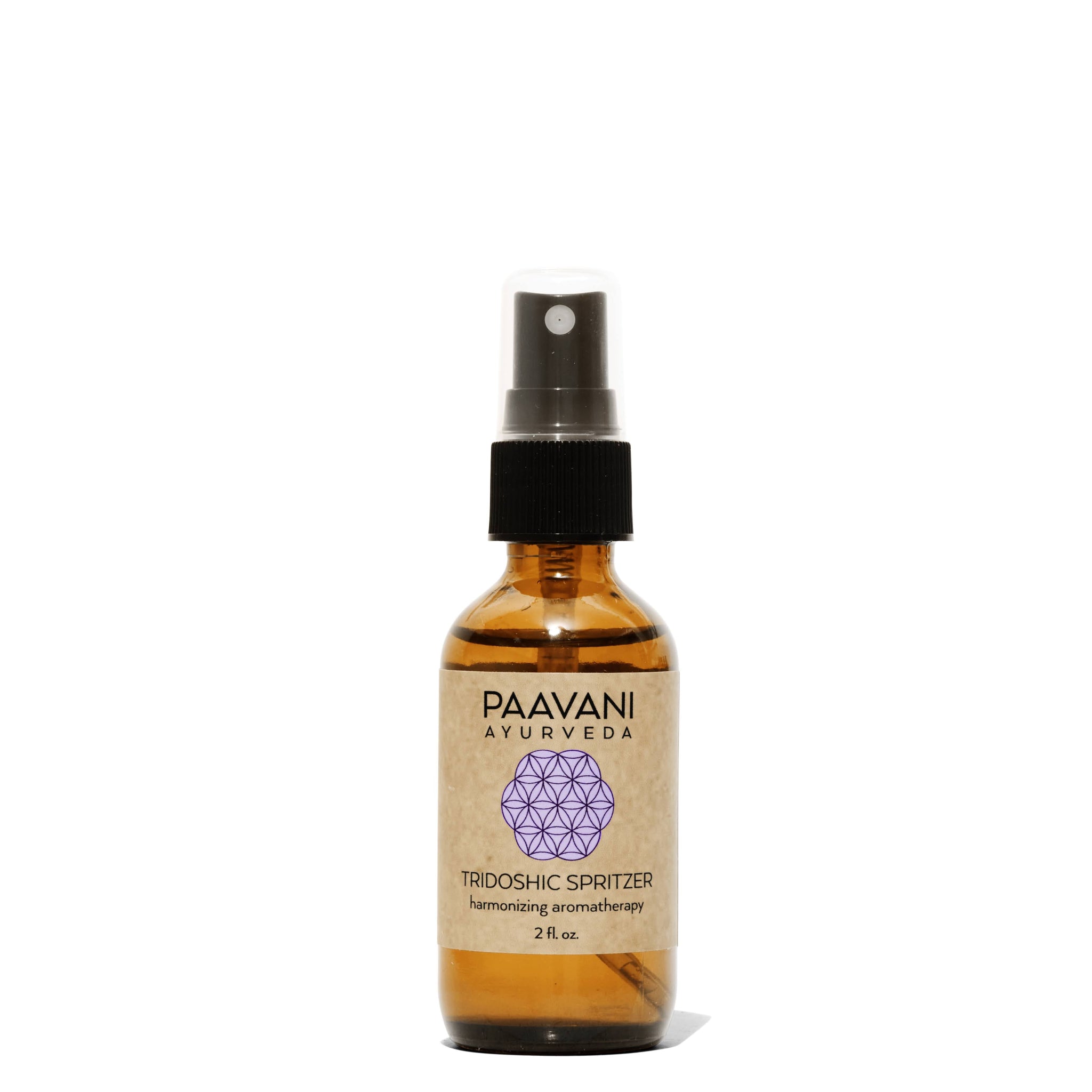 Brown bottle with black cap labeled 'Paavani Ayurveda' on a white background