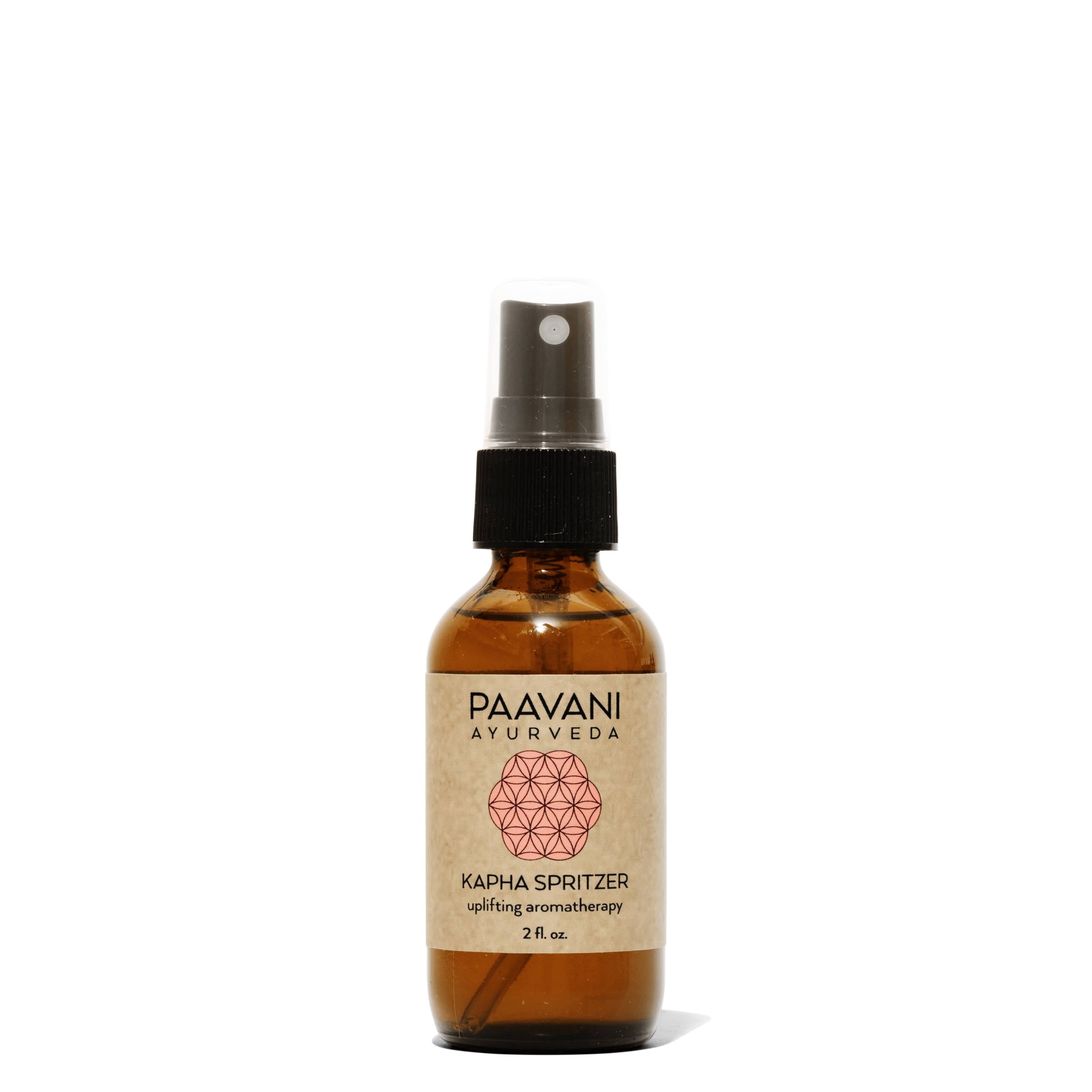 Brown bottle with black cap labeled 'Paavani Ayurveda' on a white background