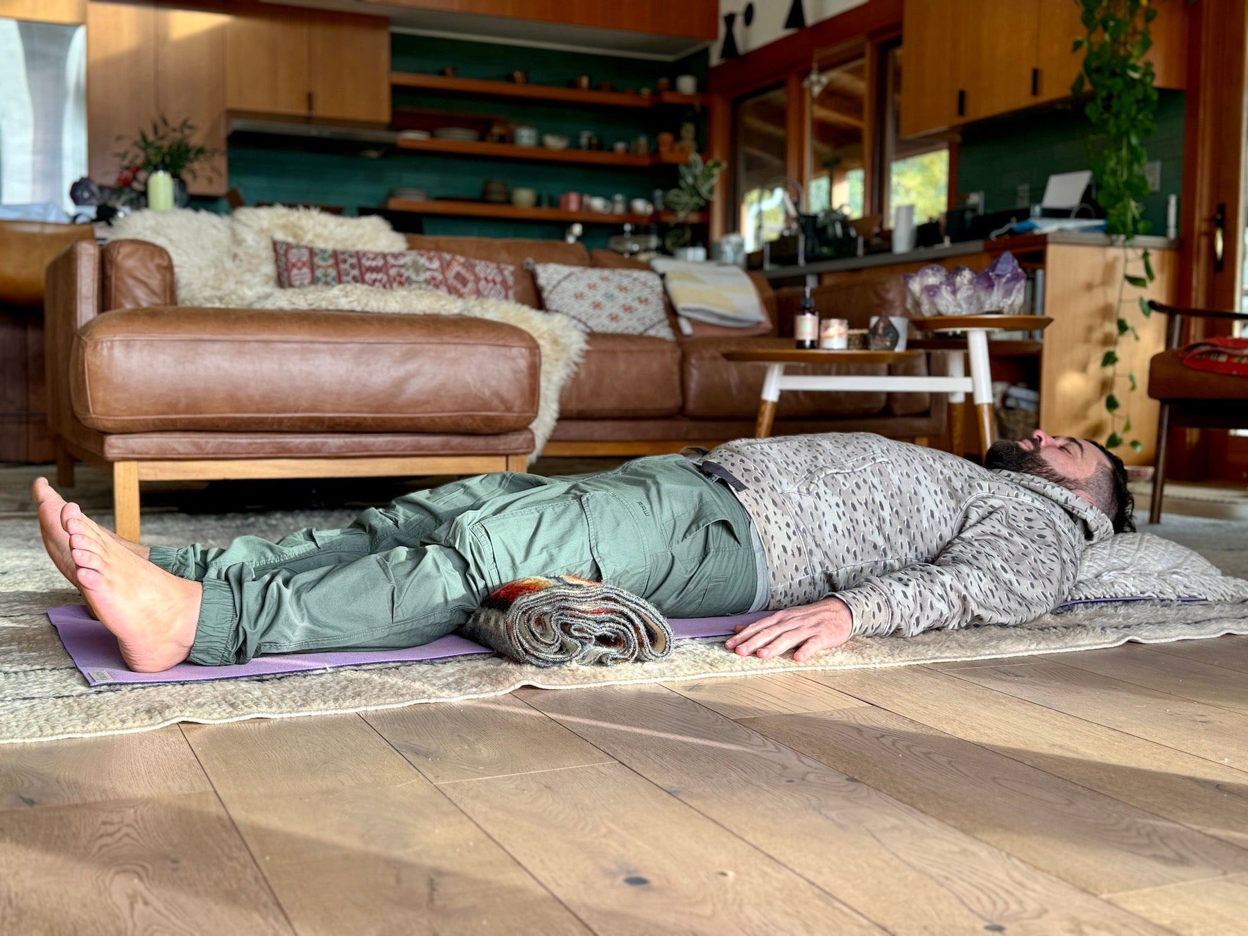 Man practicing yoga nidra