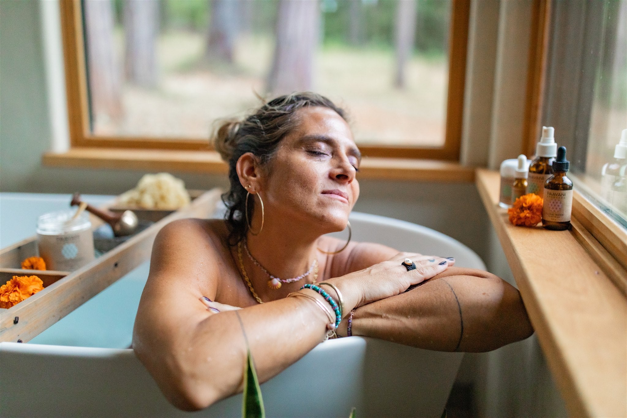 Woman taking PAAVANI Coconut Milk Bath to practice Santosha & Ayurvedic contentment