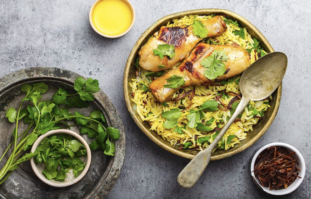 Warm, nourishing Ayurvedic meal prepared with cultured ghee, featuring golden tones & grounding ingredients to support digestion, immunity & vata season balance