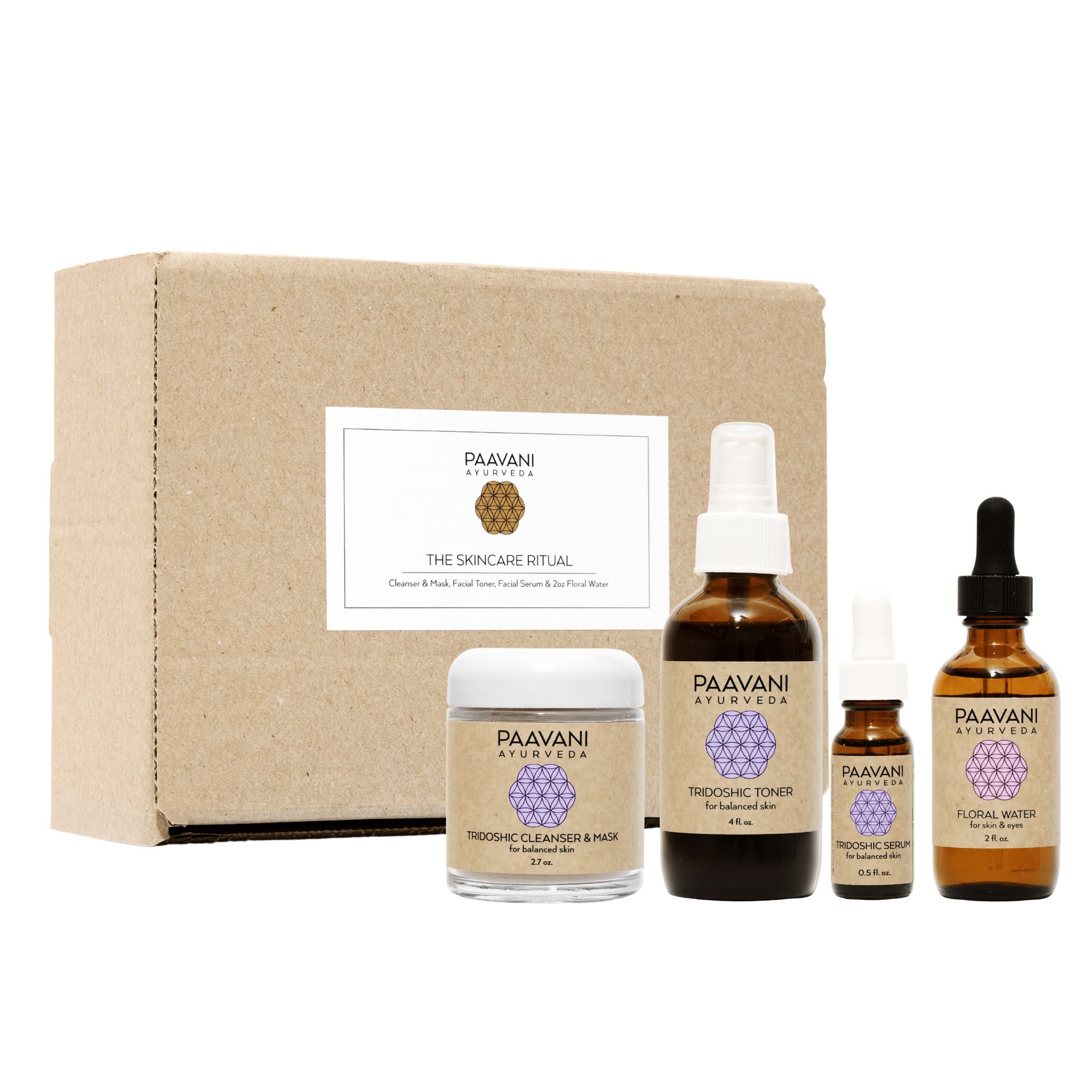 PAAVANI Ayurveda skincare product set including bottles and a box on a white background