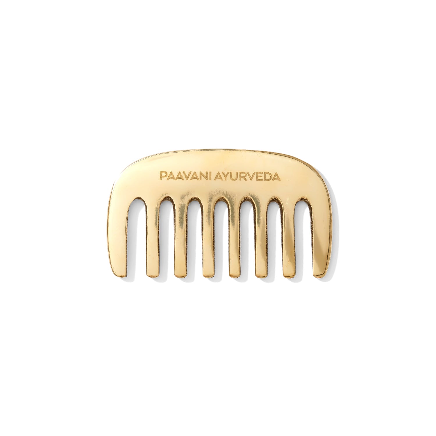 Kansa comb with 'Paavani Ayurveda' engraving on a white background