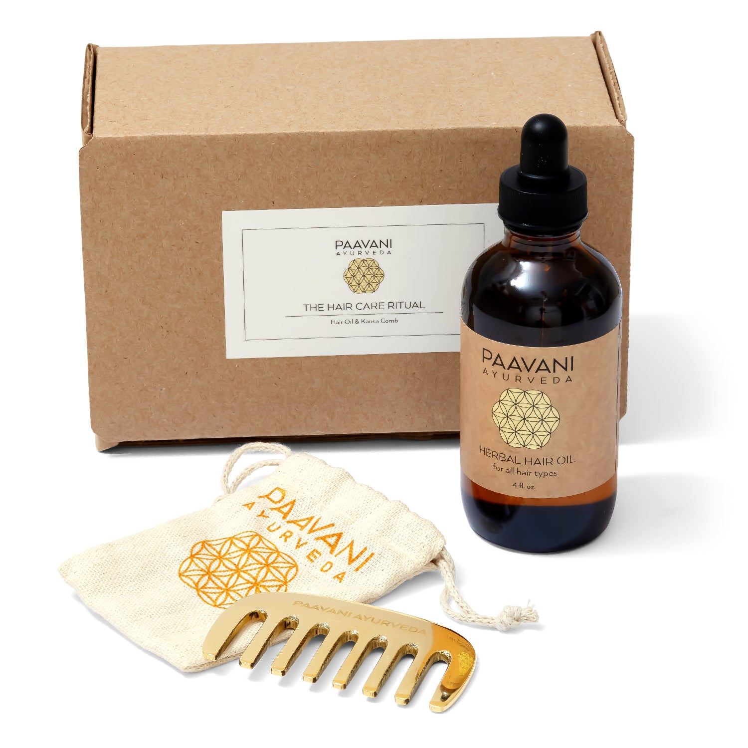 Paavani Ayurveda hair care ritual product set with herbal hair oil, kansa comb, and cloth storage pouch on a white background