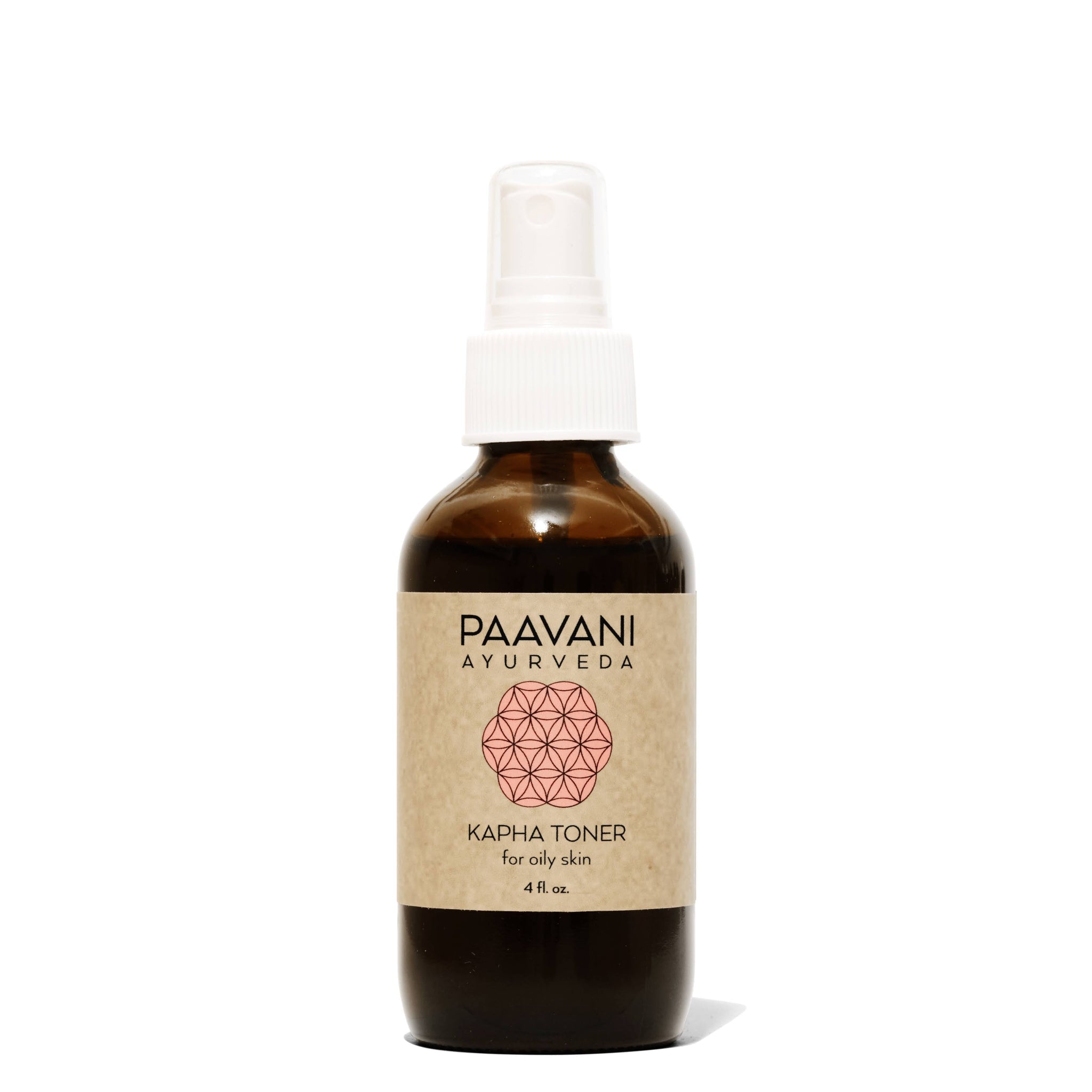 Brown bottle with a white spray nozzle labeled 'Paavani Ayurveda Kapha Toner' on a white background