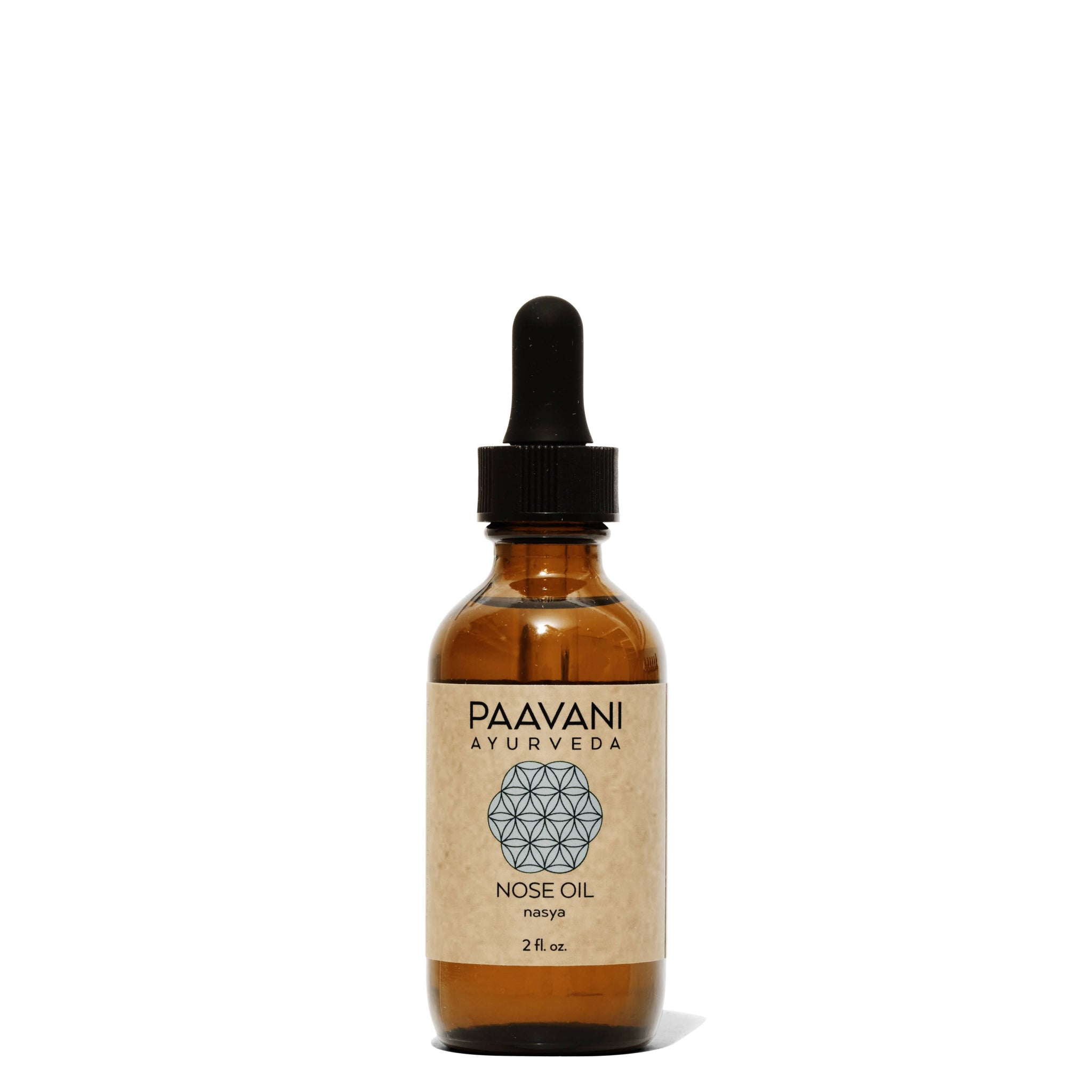 Brown glass bottle with black dropper labeled 'Paavani Ayurveda' on a white background