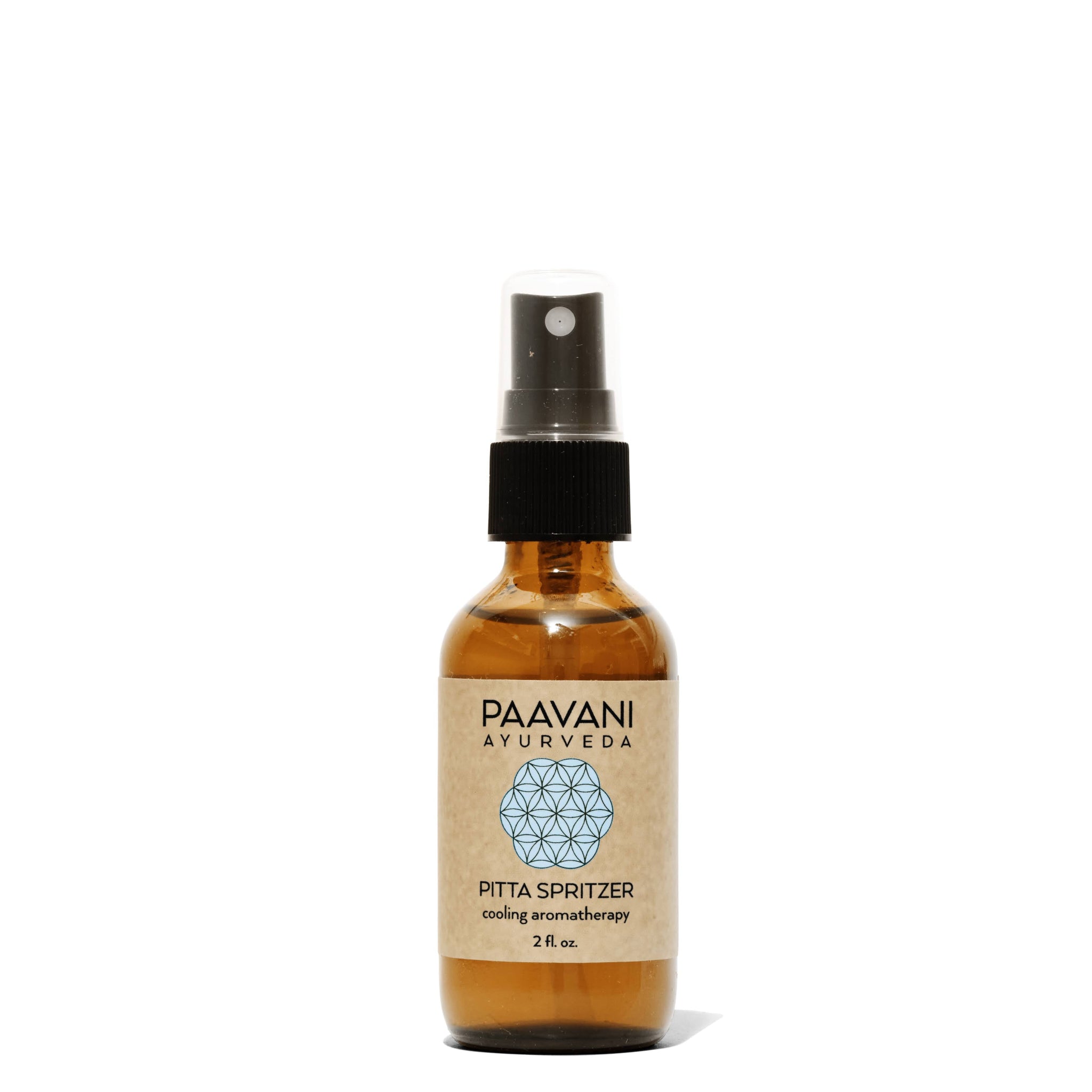 Brown bottle with a black cap labeled 'Paavani Ayurveda' on a white background