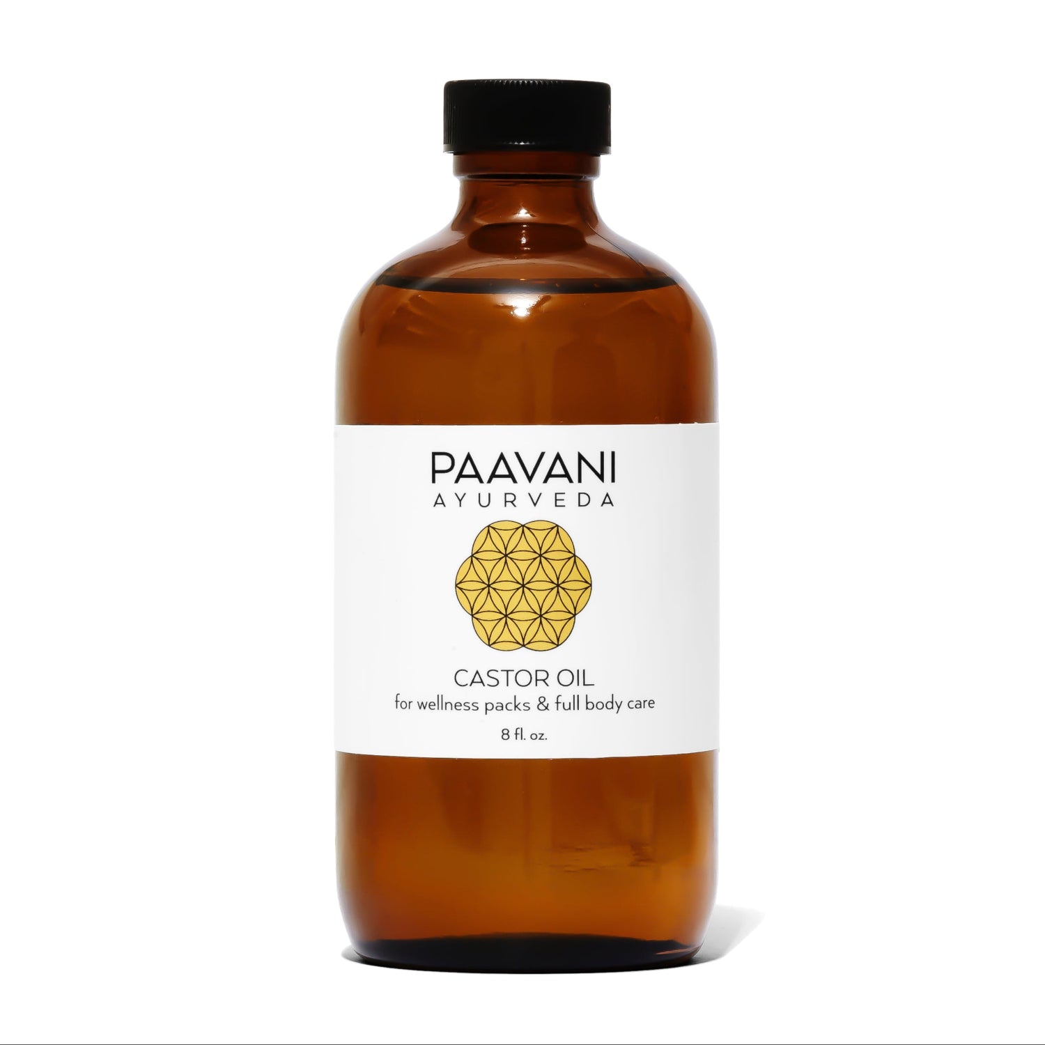 Brown bottle of Paavani Ayurveda Castor Oil with a white label on a white background